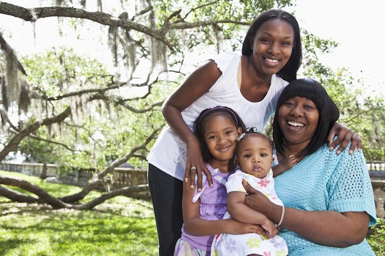 mom, grandmother, and two kids outdoor