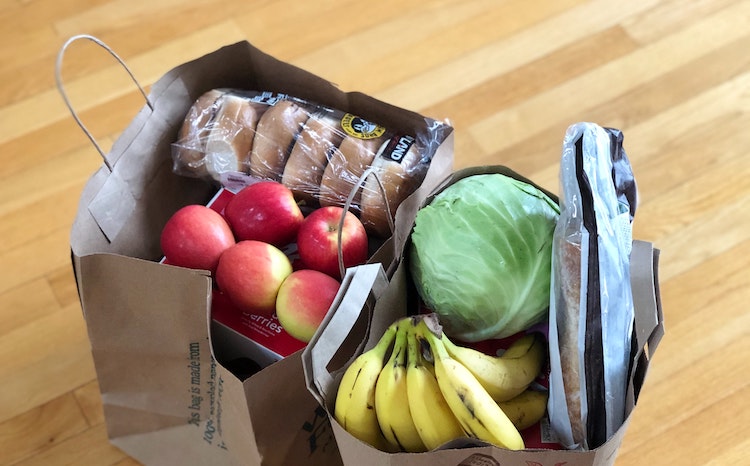 two paper bags of groceries