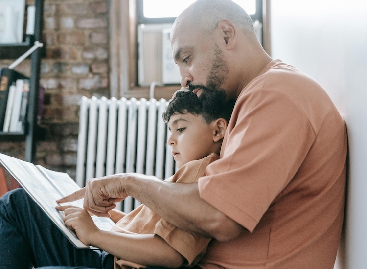 adult reading with child